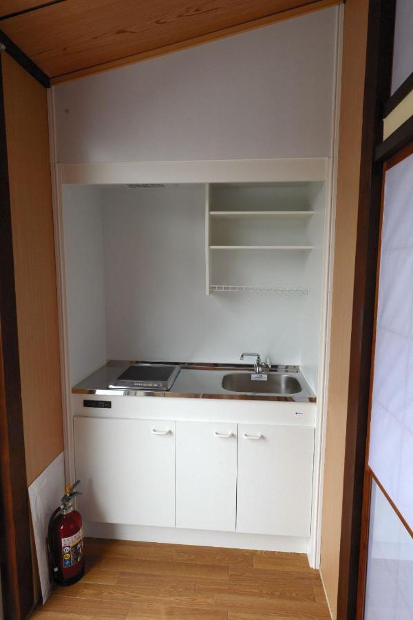 Guesthouse Iwase Toyama Station Esterno foto